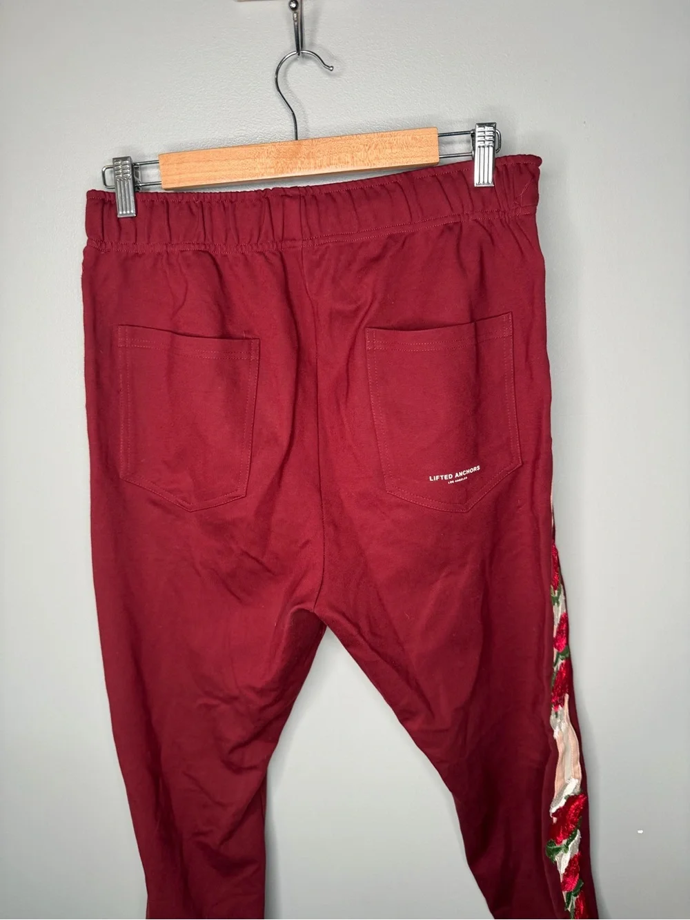 Lifted Anchors Rose Embroidered Track Pants
